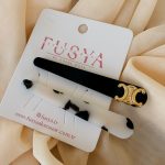 Ivory Muse Noir Clip siyah ve desenli gold detaylı ikili kadın saç tokası.