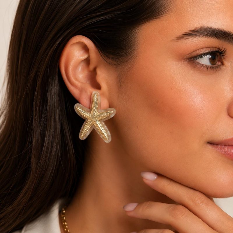 Ocean Breeze Star Glow krem gold deniz yıldızı kadın küpe model görseli